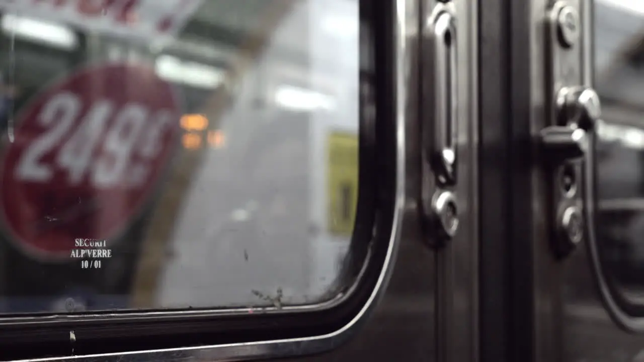 Closing doors in subway train and departing