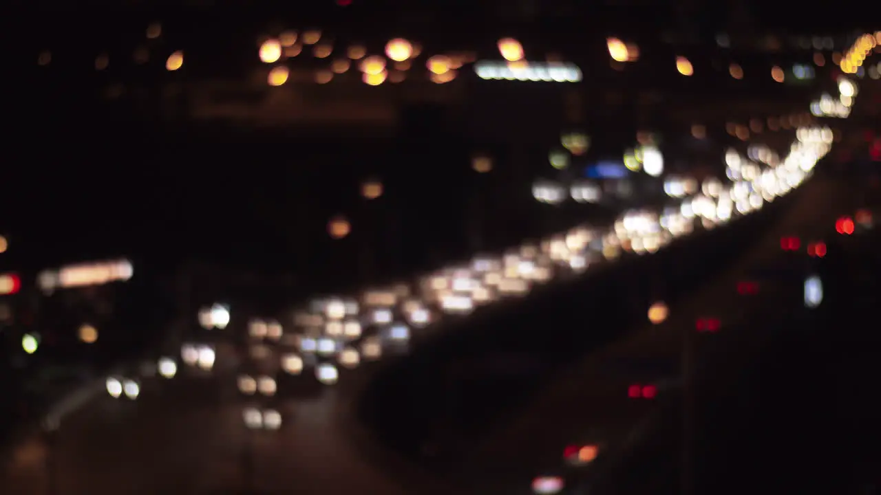 Car traffic in night city defocus