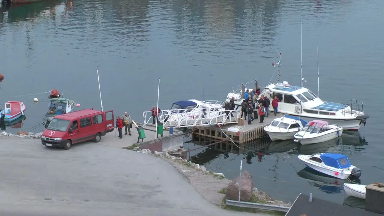 Greenland Qaqortoq people leaving boat p