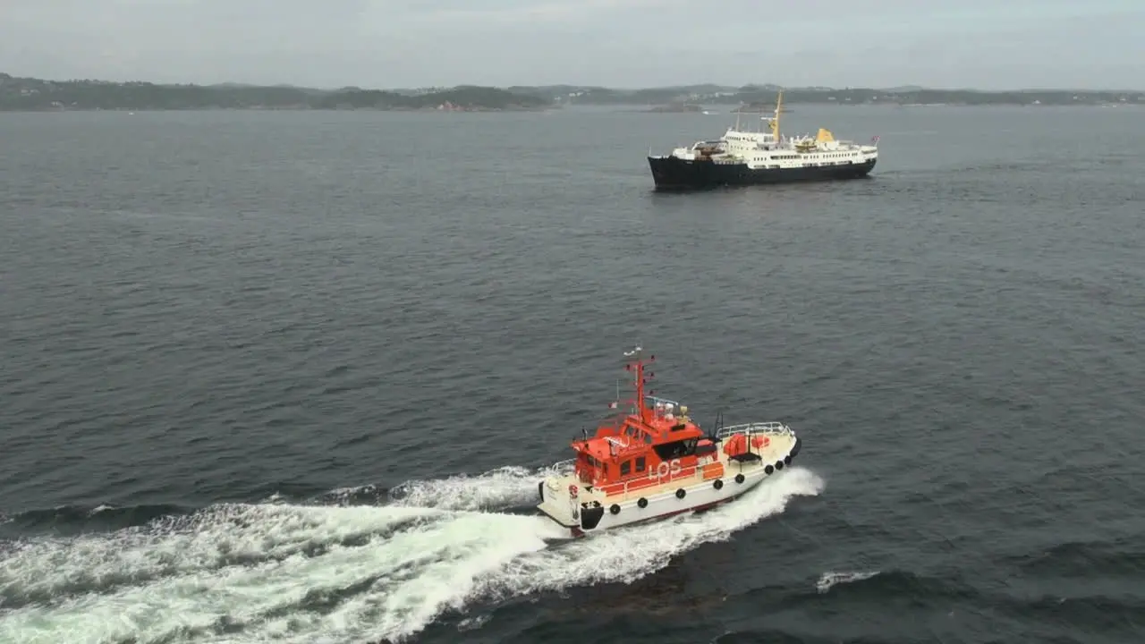 Norway pilot boat passes ship sb