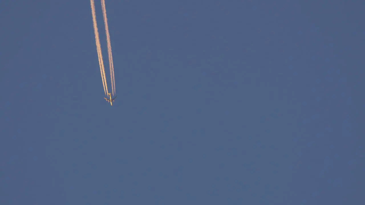 Distant view of plane flying in the sky