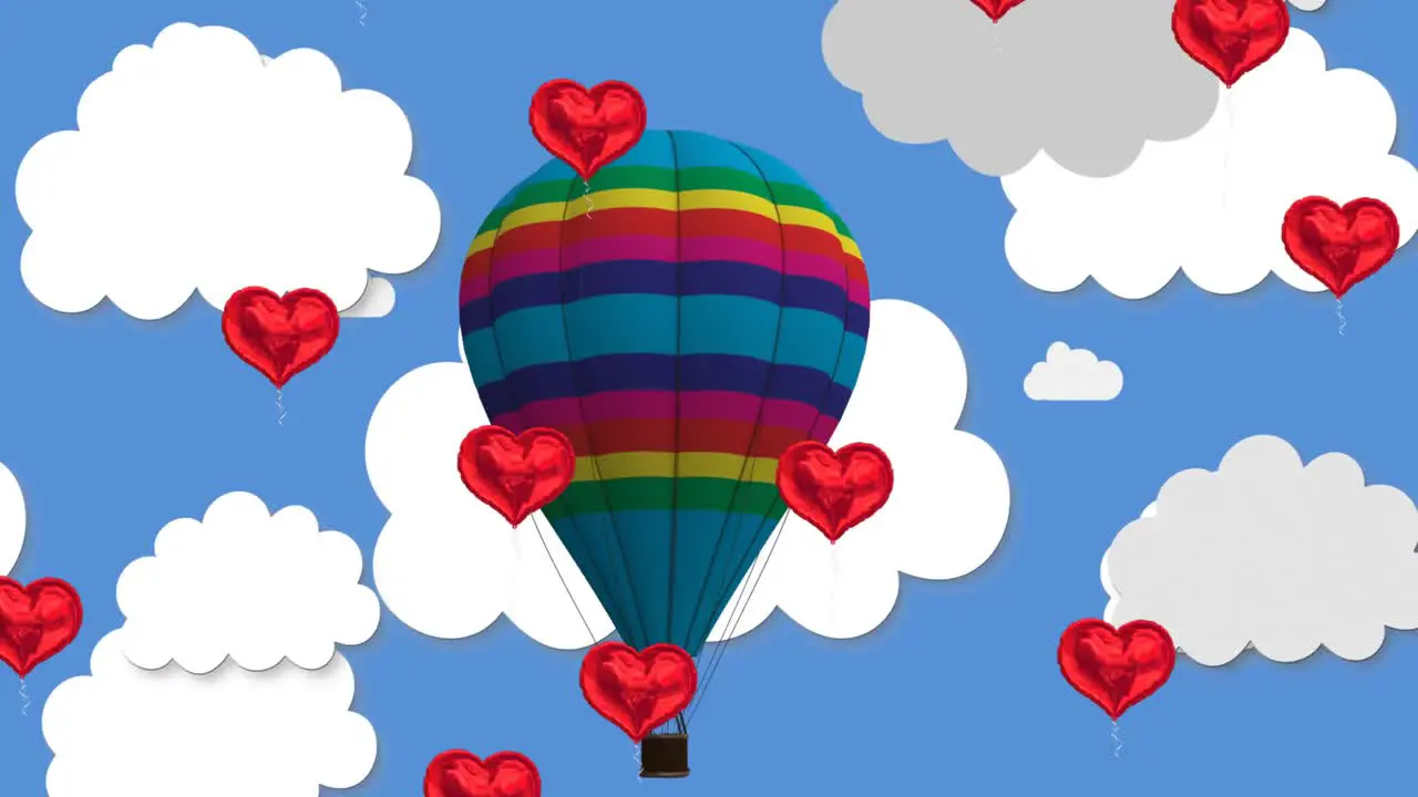 Multiple heart shaped balloons floating against blue sky