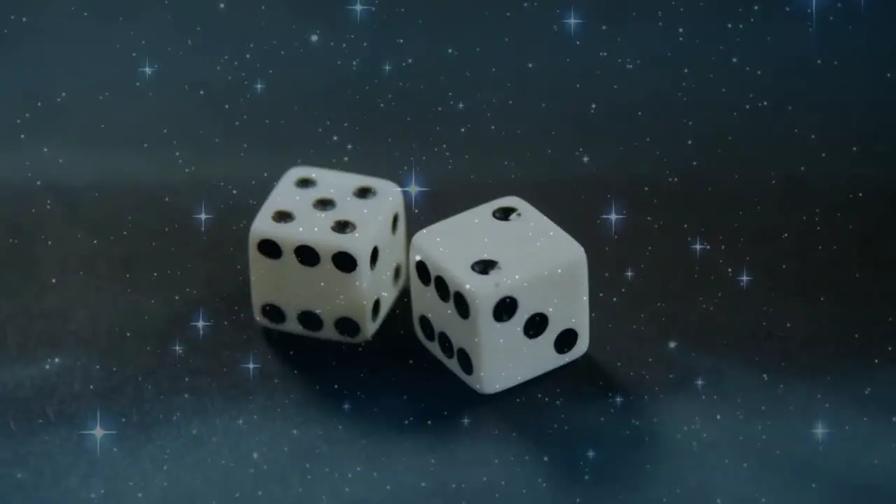 Whie dice surrounded by stars