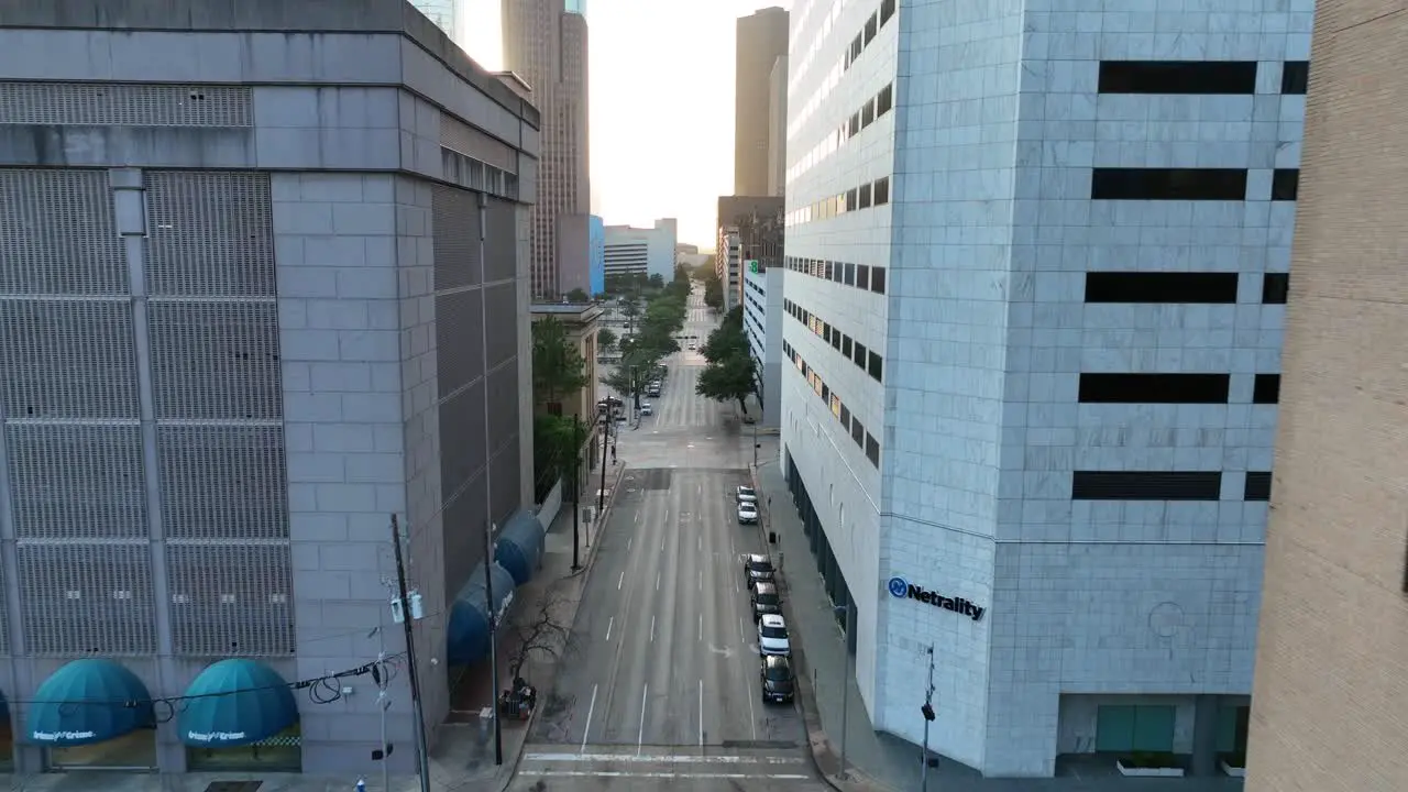 Aerial through downtown Houston Texas street