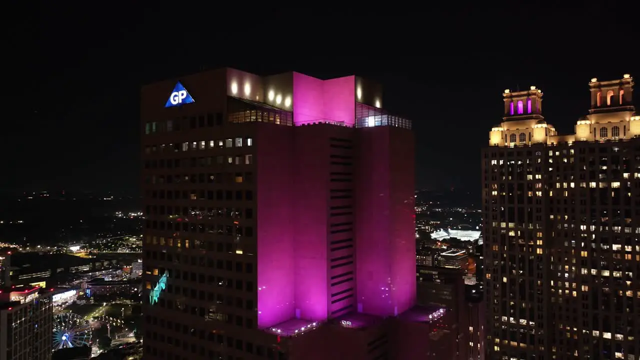 Drone shot of Georgia Atlanta modern skyscrapers at night Georgia- Pacific building at night