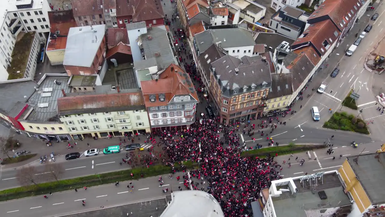 Aerial drone view of the FCK Kaiserslautern fans with beer in the old city of Kaiserslautern Germany