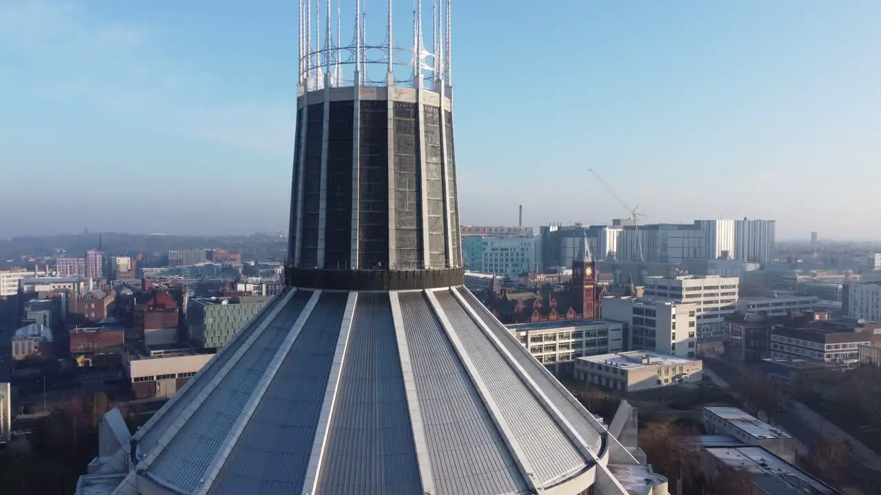 Liverpool Metropolitan cathedral contemporary city famous rooftop spires aerial close to pull back