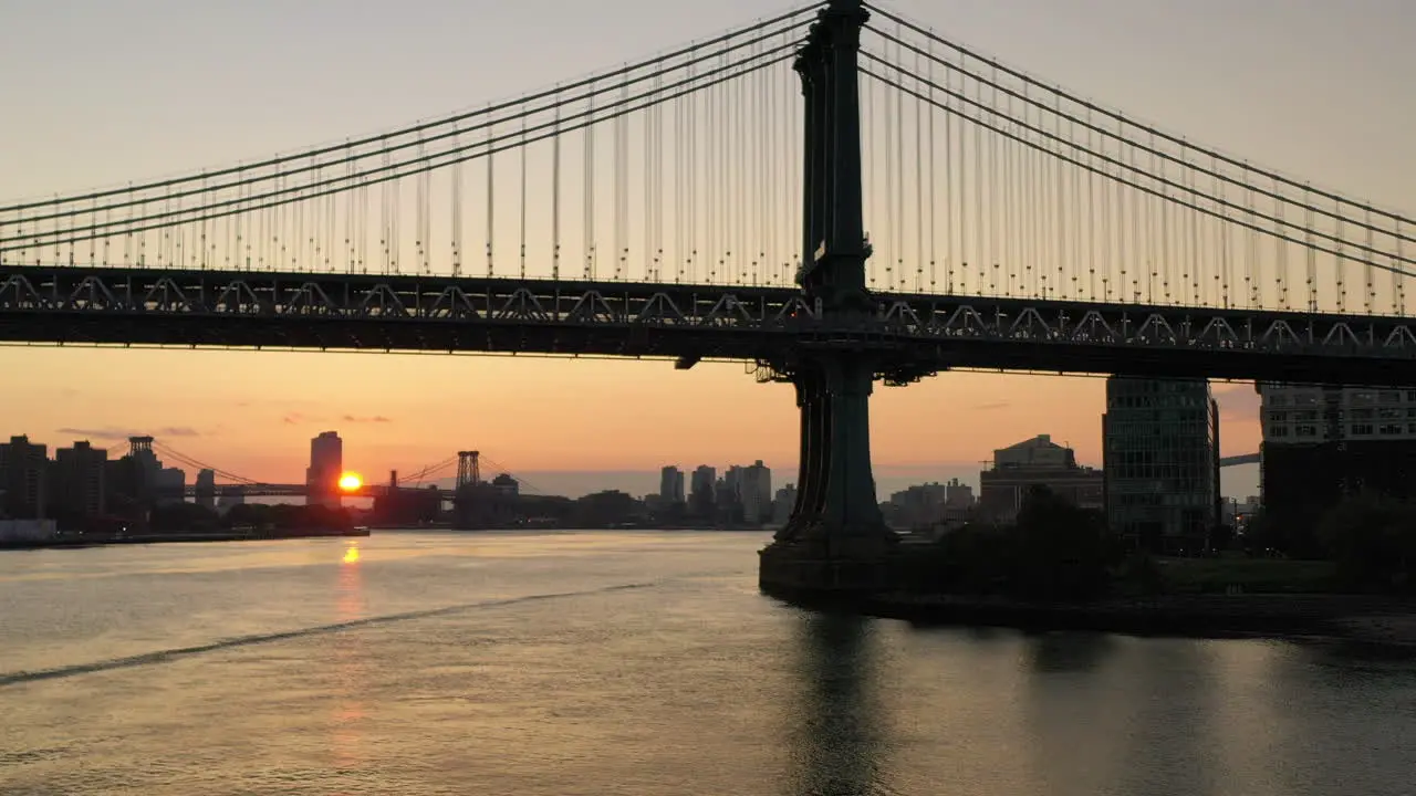 A dramatic view of the calm East River at sunrise