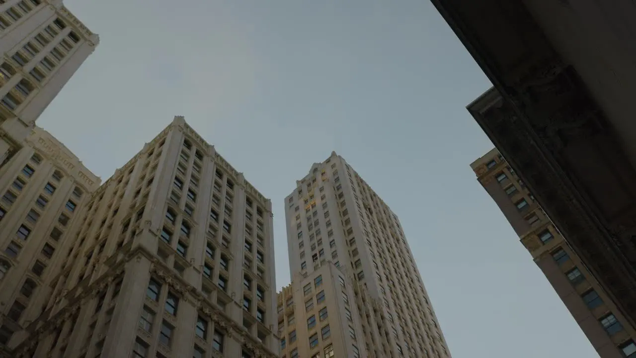 Worms eye view looking up at tall Chicago skyscraper buildings