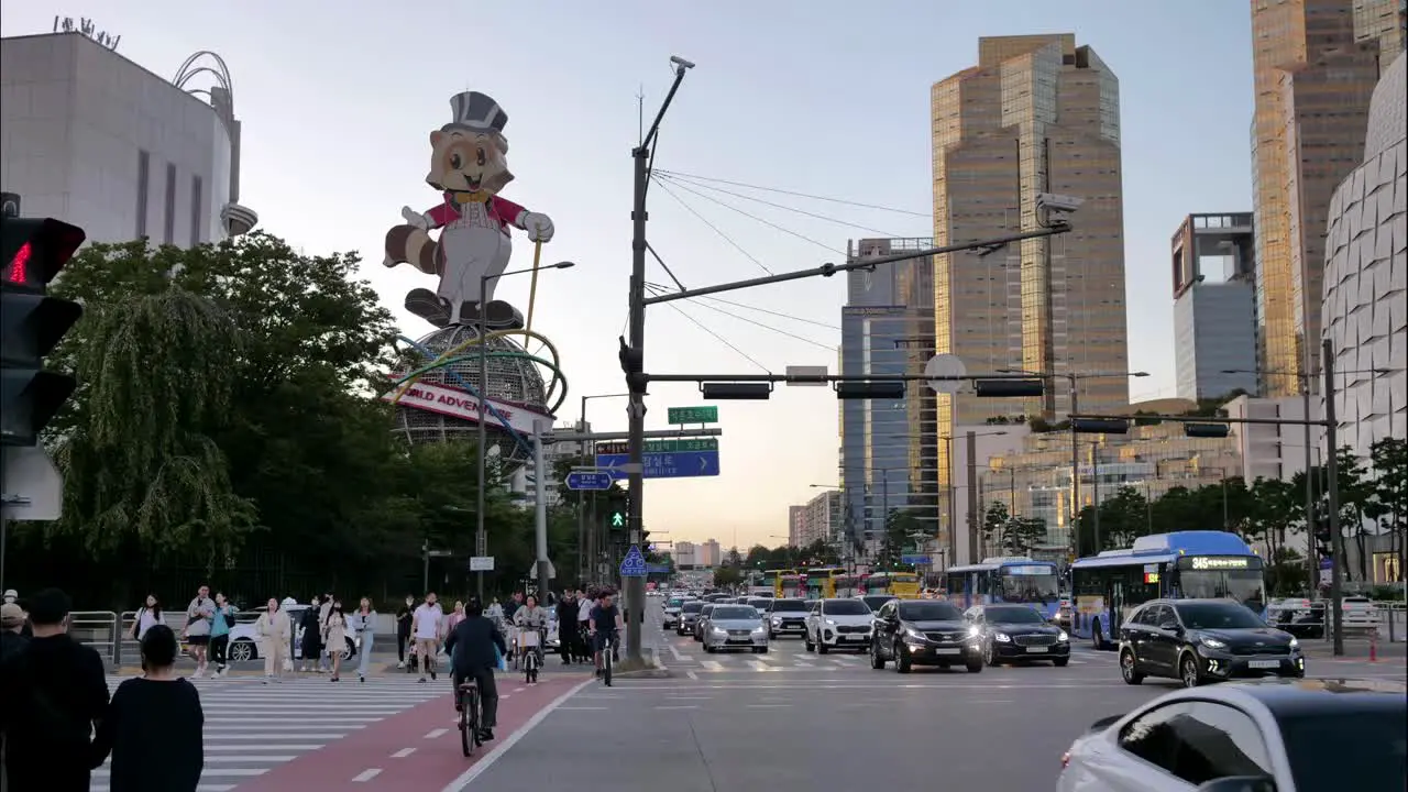 Busy downtown South Korea Seoul city rush hour traffic and pedestrian crossing time lapse