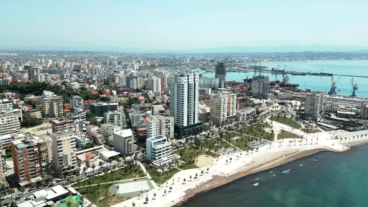 Durres promenade harbor city buildings and Adriatic Sea beach view from a drone