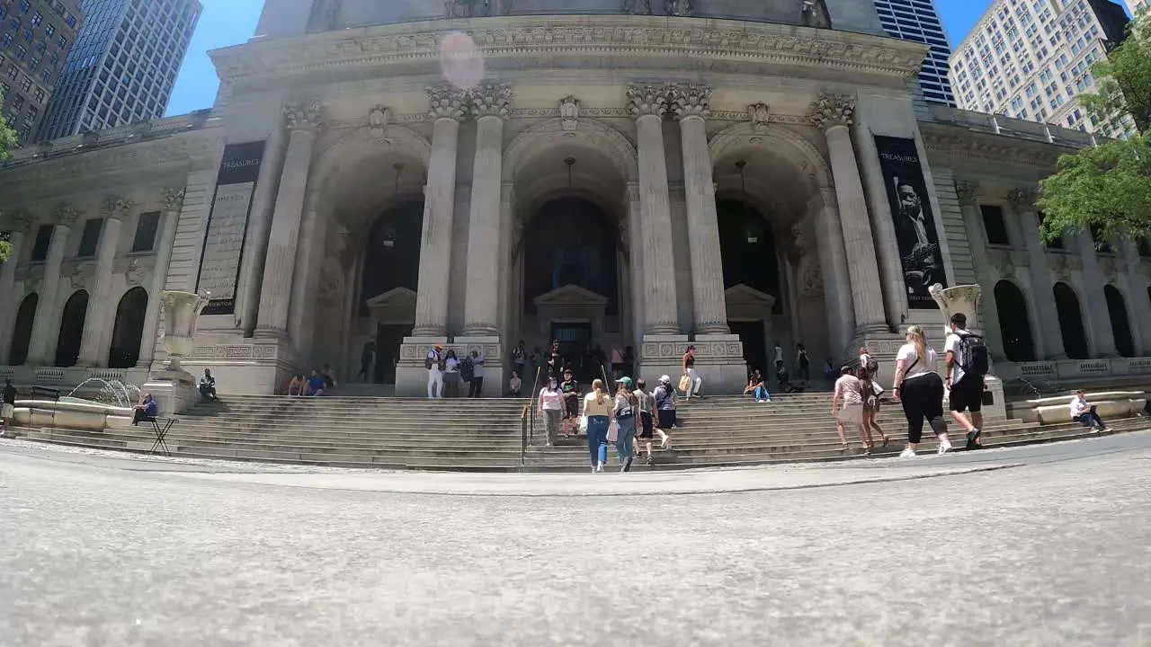 Large Crowd Of Students Coming In And Out Of The Public Library In New York City USA