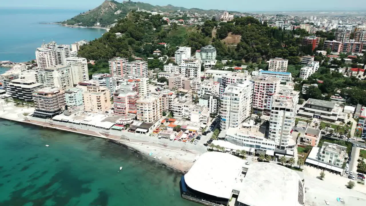 Durres city buildings and Adriatic Sea beach aerial view from a drone