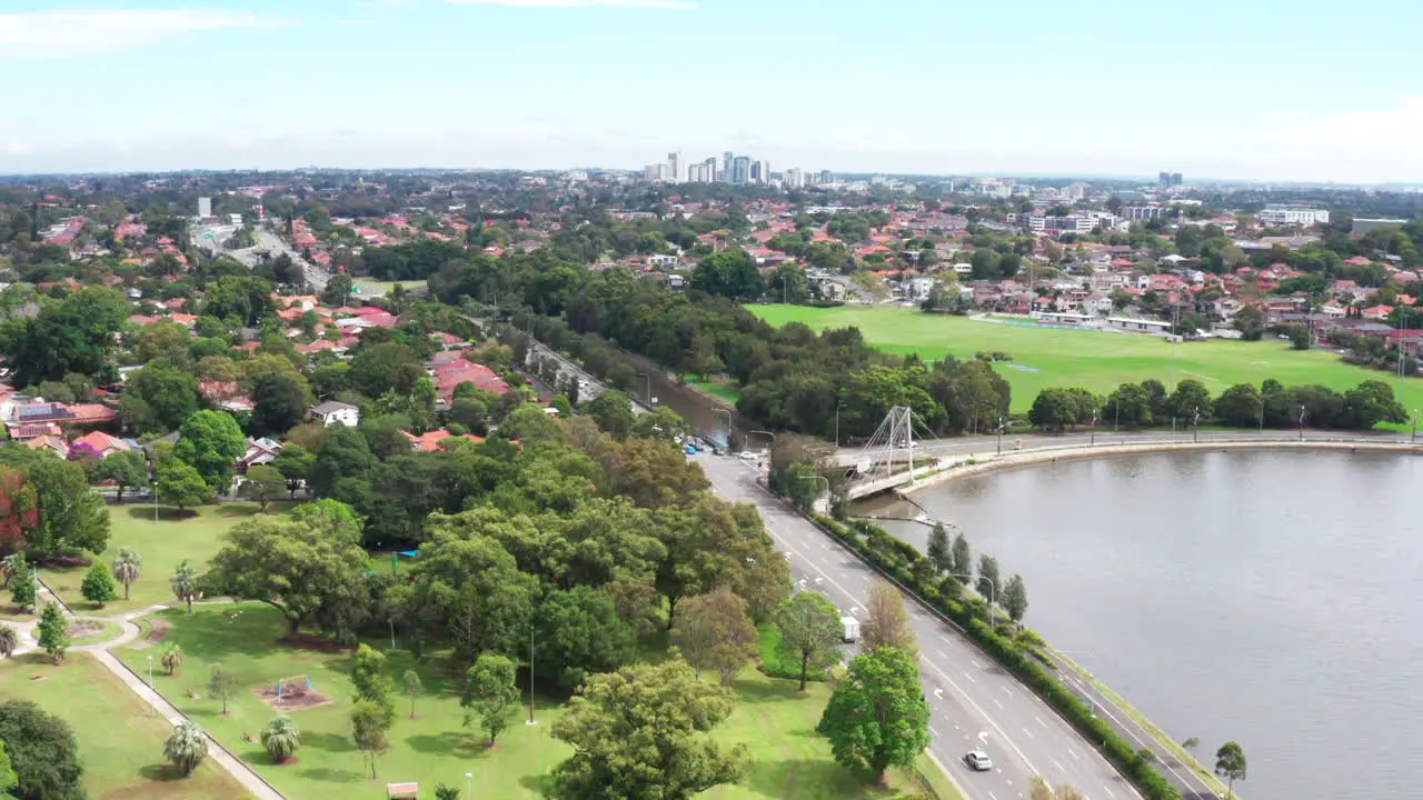 Aerial drone shot flying backwards near the A4 highway in Sydney Australia