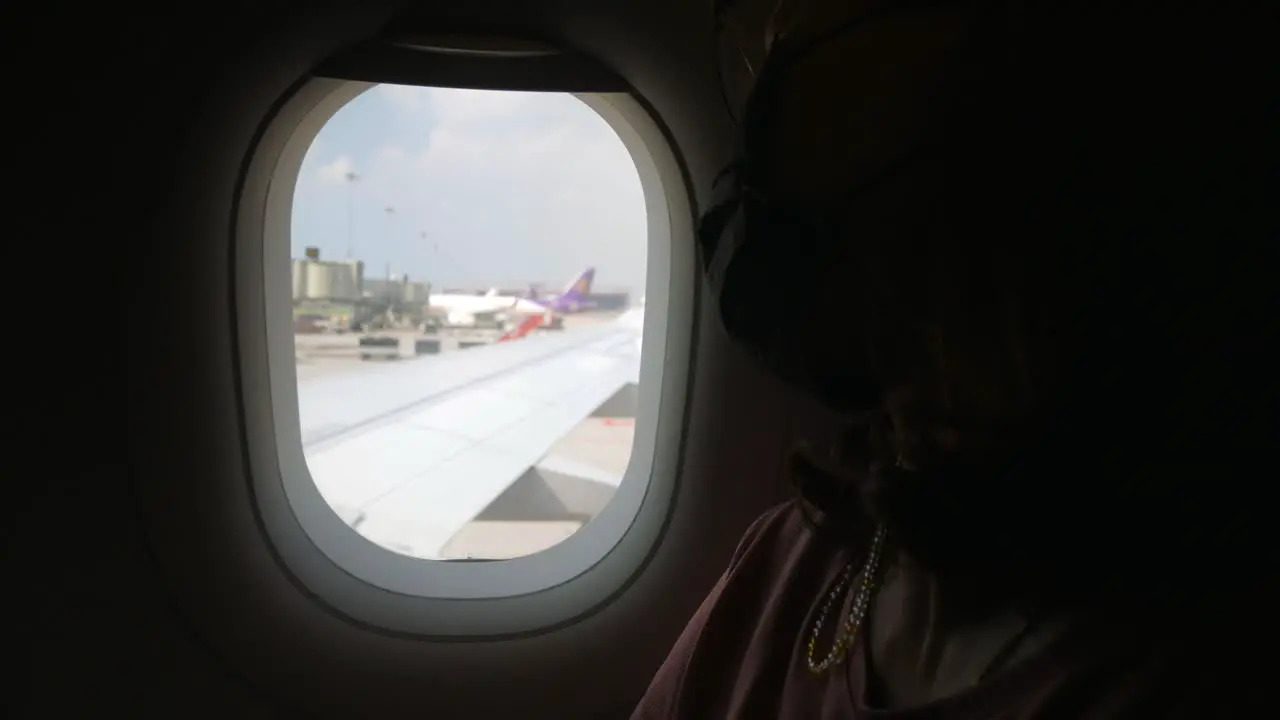 View through plane window while parking in airport