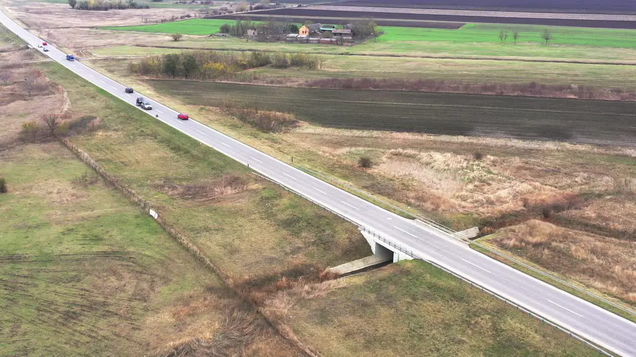 Countryside road traffic from drone point of view aerial view