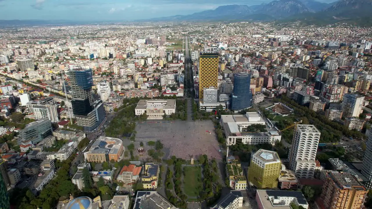 Central Square of Tirana's Capital Offering a Glimpse into the City's Vibrancy with Surrounding Buildings and Streets