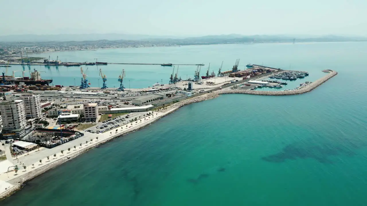 Durres city buildings and port by the Adriatic Sea aerial view from a drone