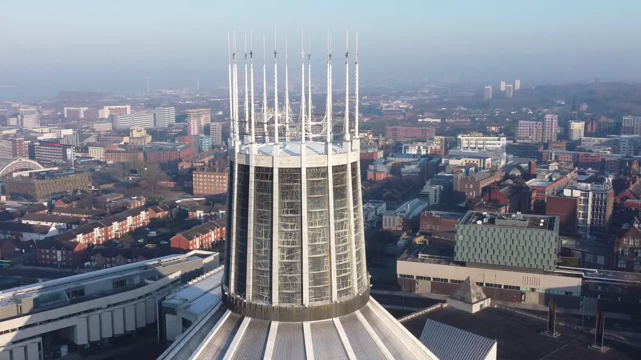 Liverpool Metropolitan cathedral contemporary city famous rooftop spires aerial push in right