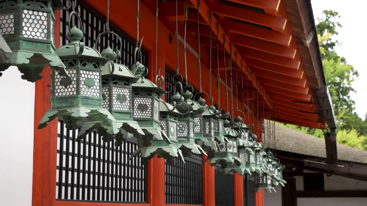 Hanging bronze lanterns at Kasuga Taisha shrine in Nara Japan