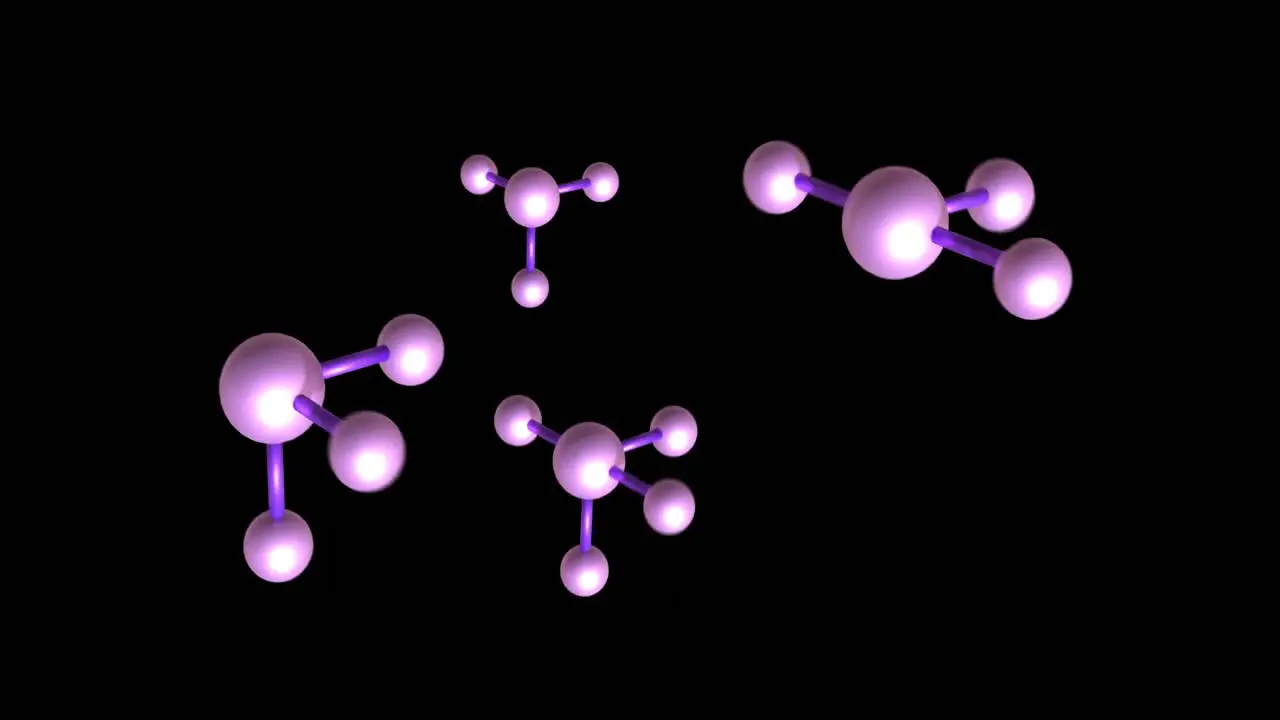 Animation of macro of purple molecules on black background