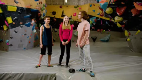 Friends in a climbing gym