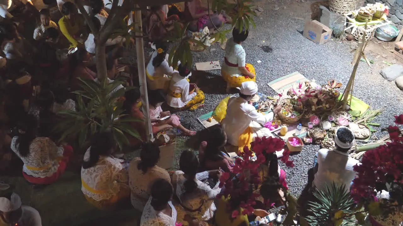 Balinese people perform the ceremony for the lunar moon celebration