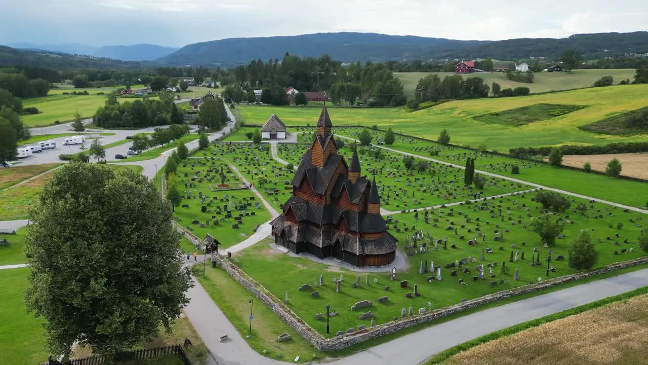 Heddal Stave Church and Headstones in Vestfold og Telemark Norway Scandinavia Aerial 4k