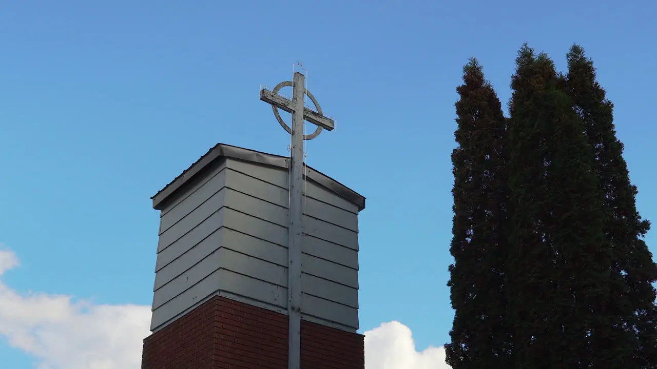 Handheld footage of church cross