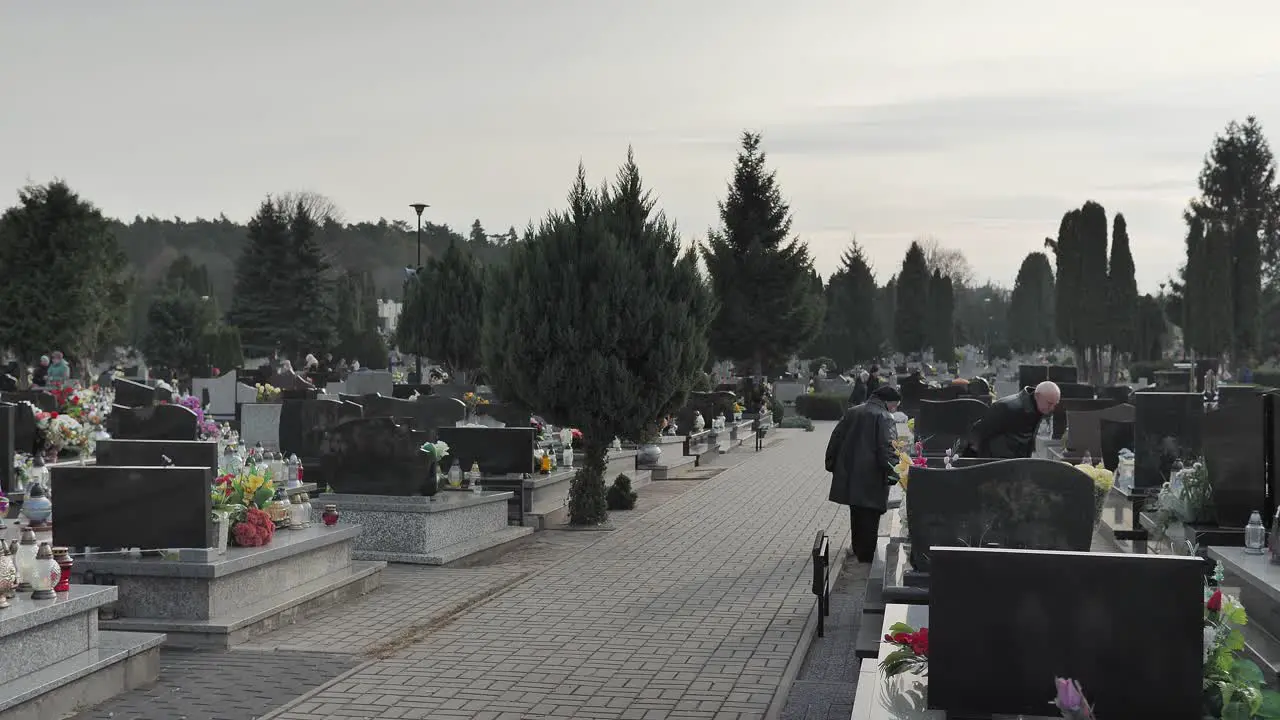 Cemetery old people go to the grave