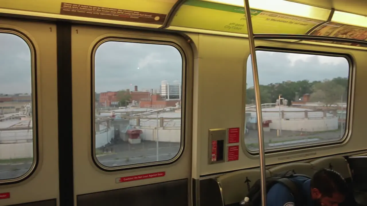 Panning Shot of Inside a Subway Car at Dusk