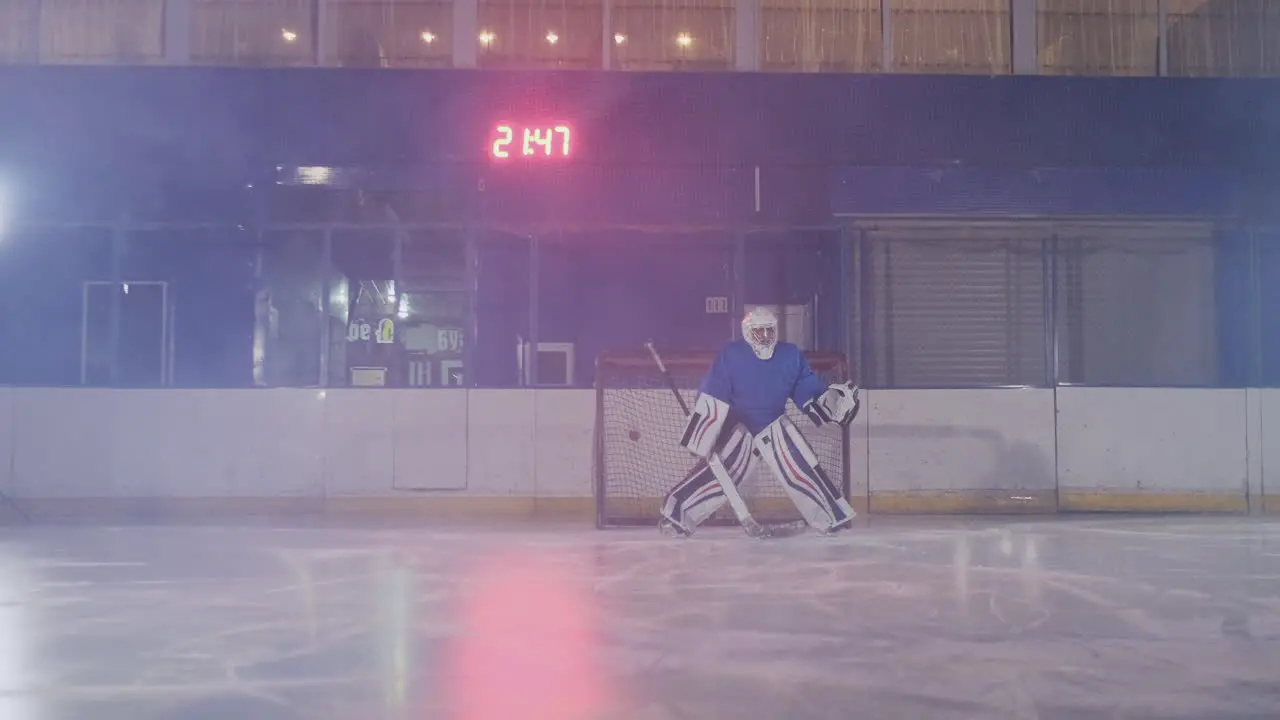 Hockey player carries out an attack on the opponent's goal and scores a goal in extra time The player brings victory to his team in shootouts