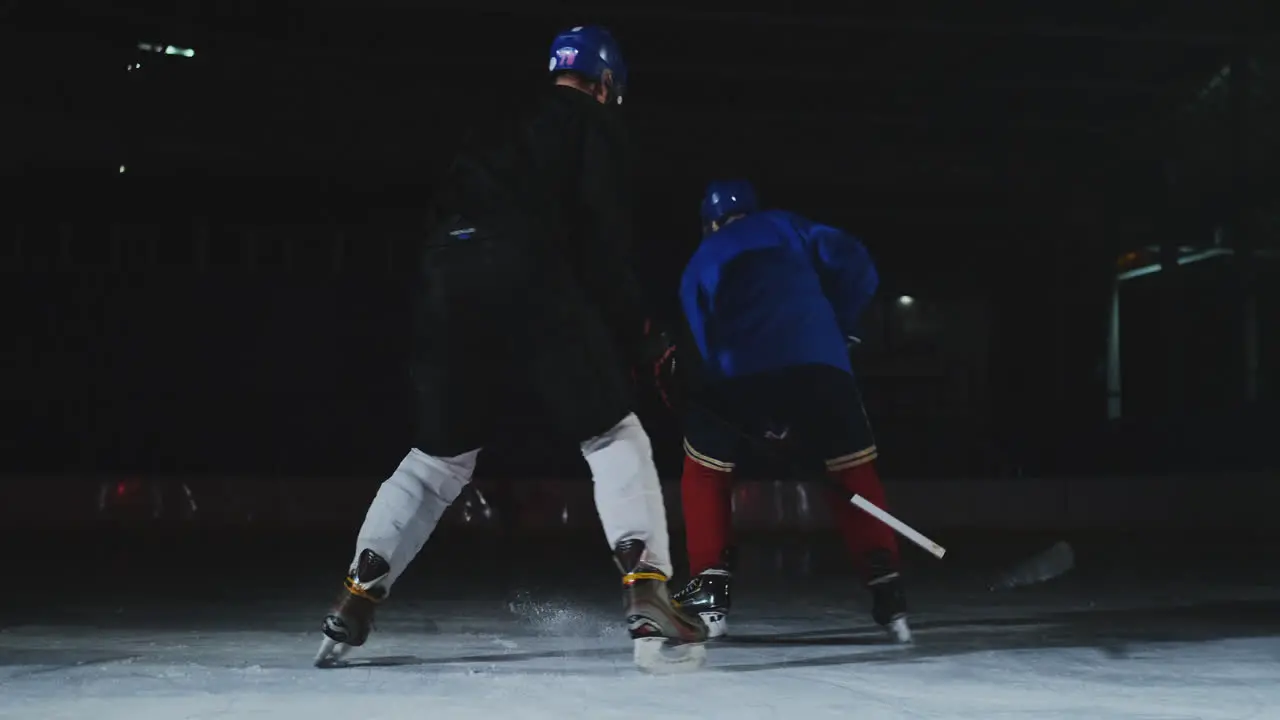 Professional hockey forward technically beats the defender and quickly goes to the hockey goal