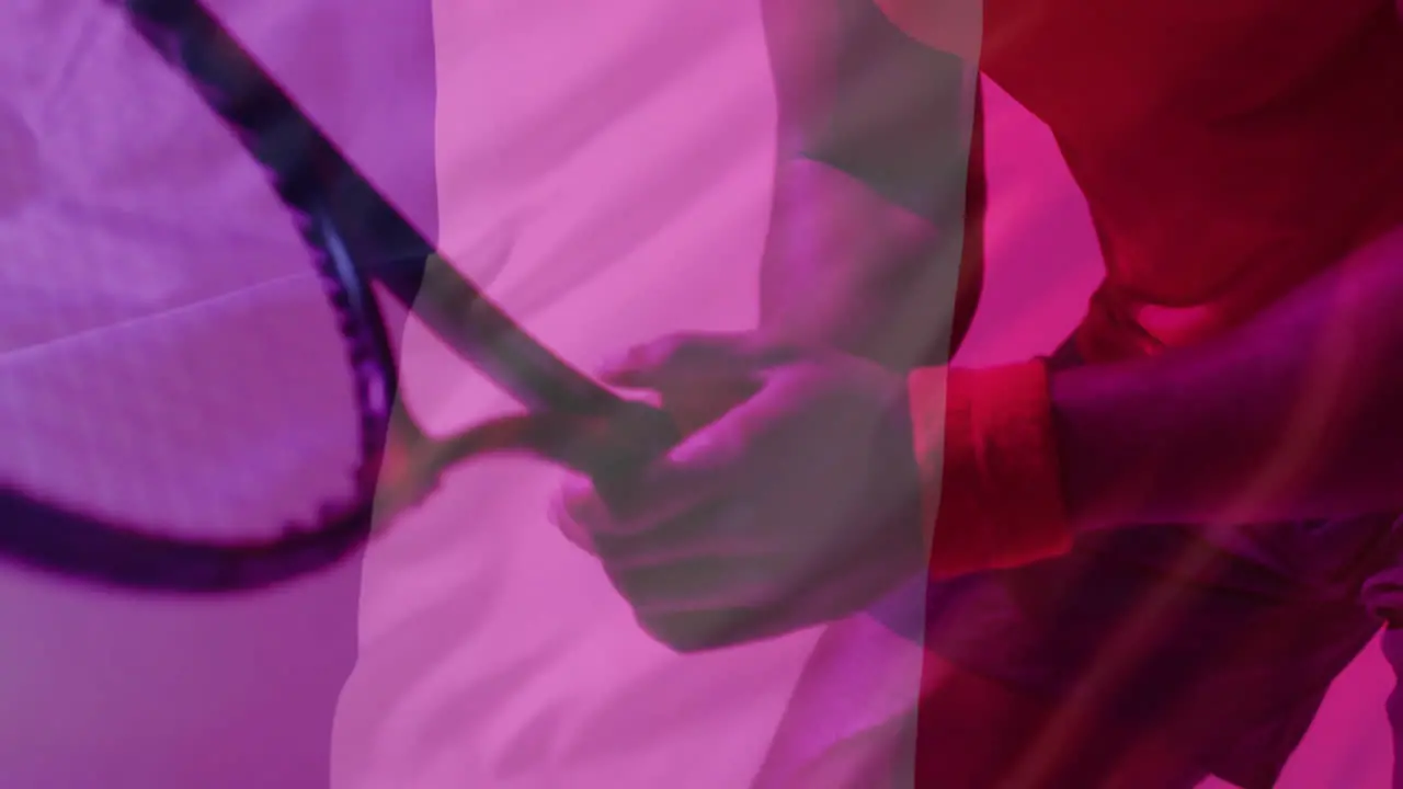 Animation of flag of france over african american male tennis player