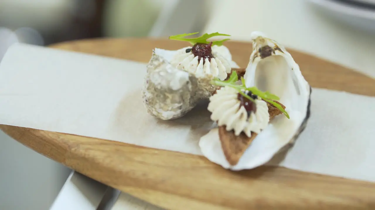 Close shooting camera slowly goes around a plate with fresh salad