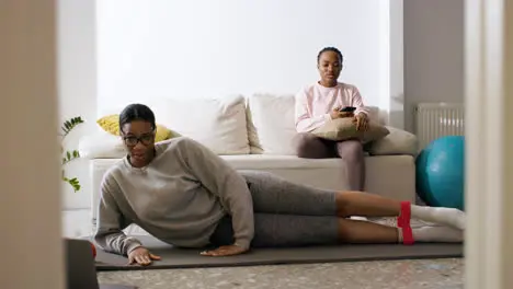 Woman doing sports at home