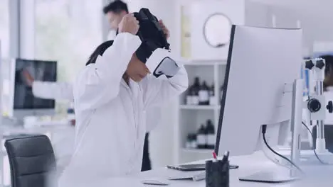 Scientist using virtual reality goggles to examine