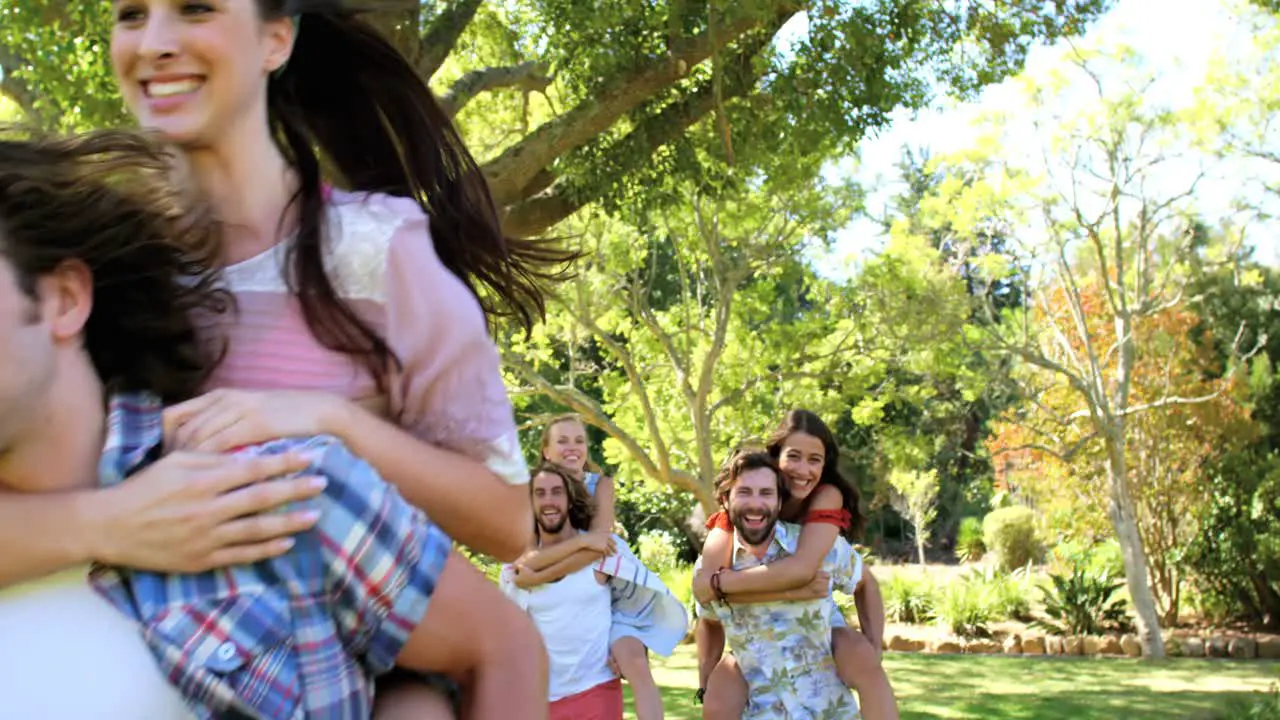 Hipster men holding their girlfriend and running