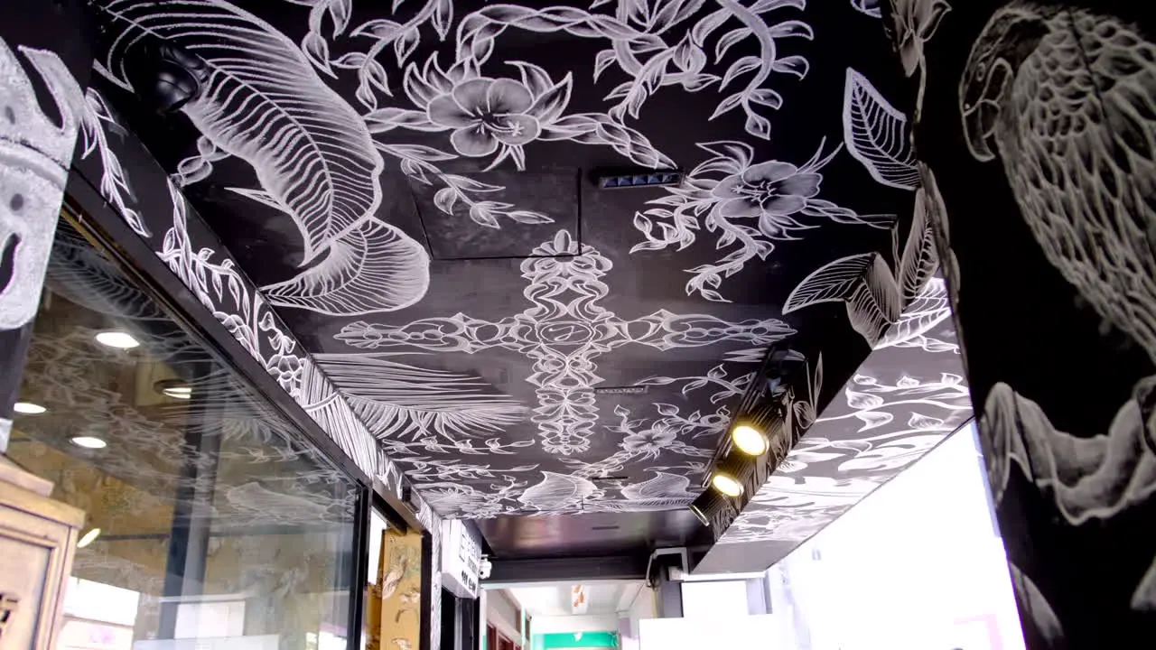 A ceiling wall with black and white colour of a murals