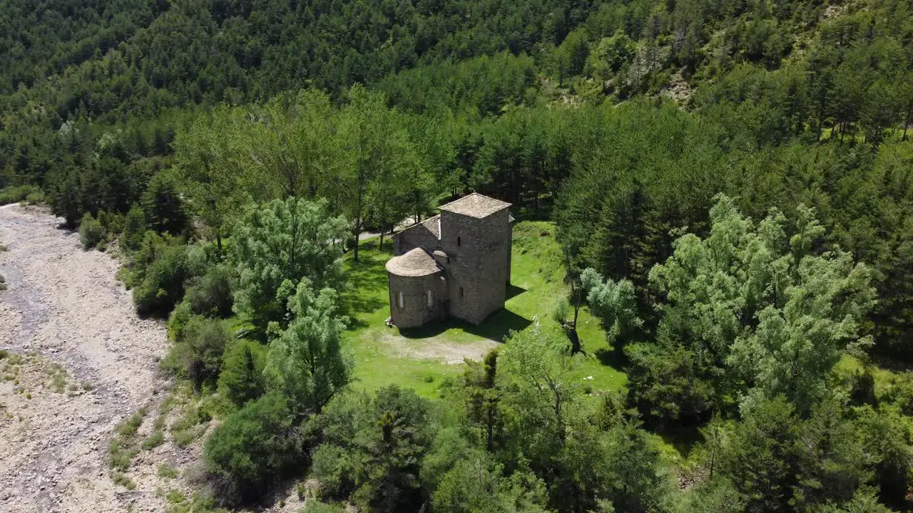 Circular drone view of a mountain church