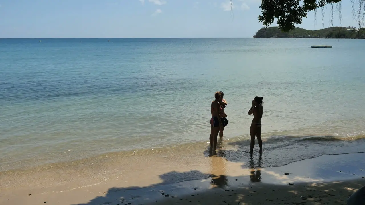 New Caledonia Noumea Girls Stand By Lagoon