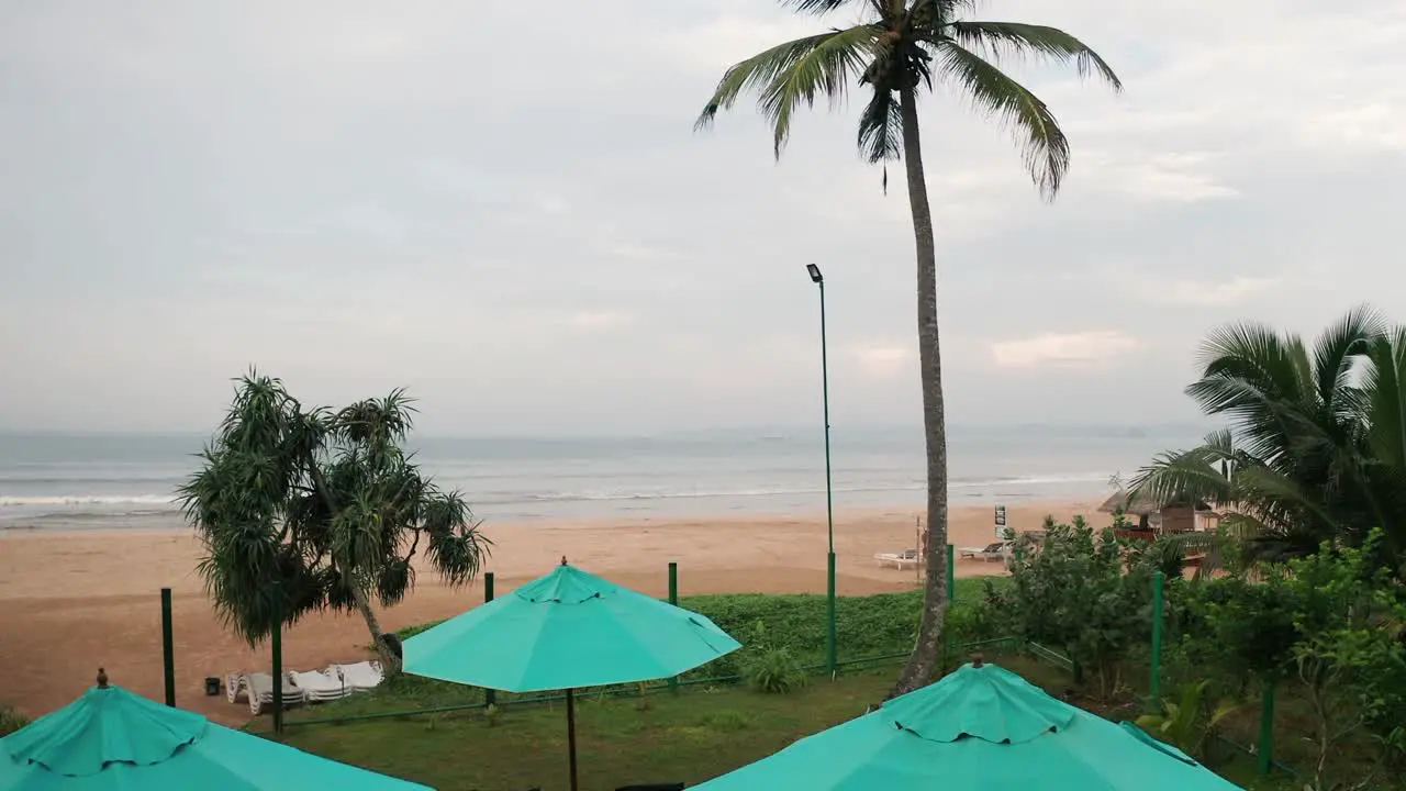 Young woman in infinity pool enjoying luxury lifestyle at hotel spa with view of a beach