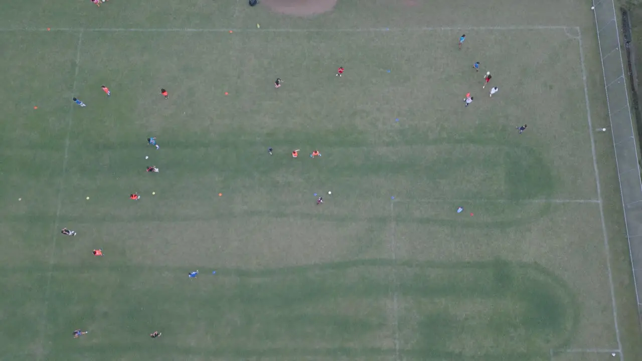 Overhead Drone Shot Panning Over Girls Soccer Practice