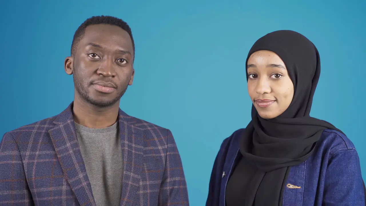 Portrait of African young Muslim man and African Muslim young woman