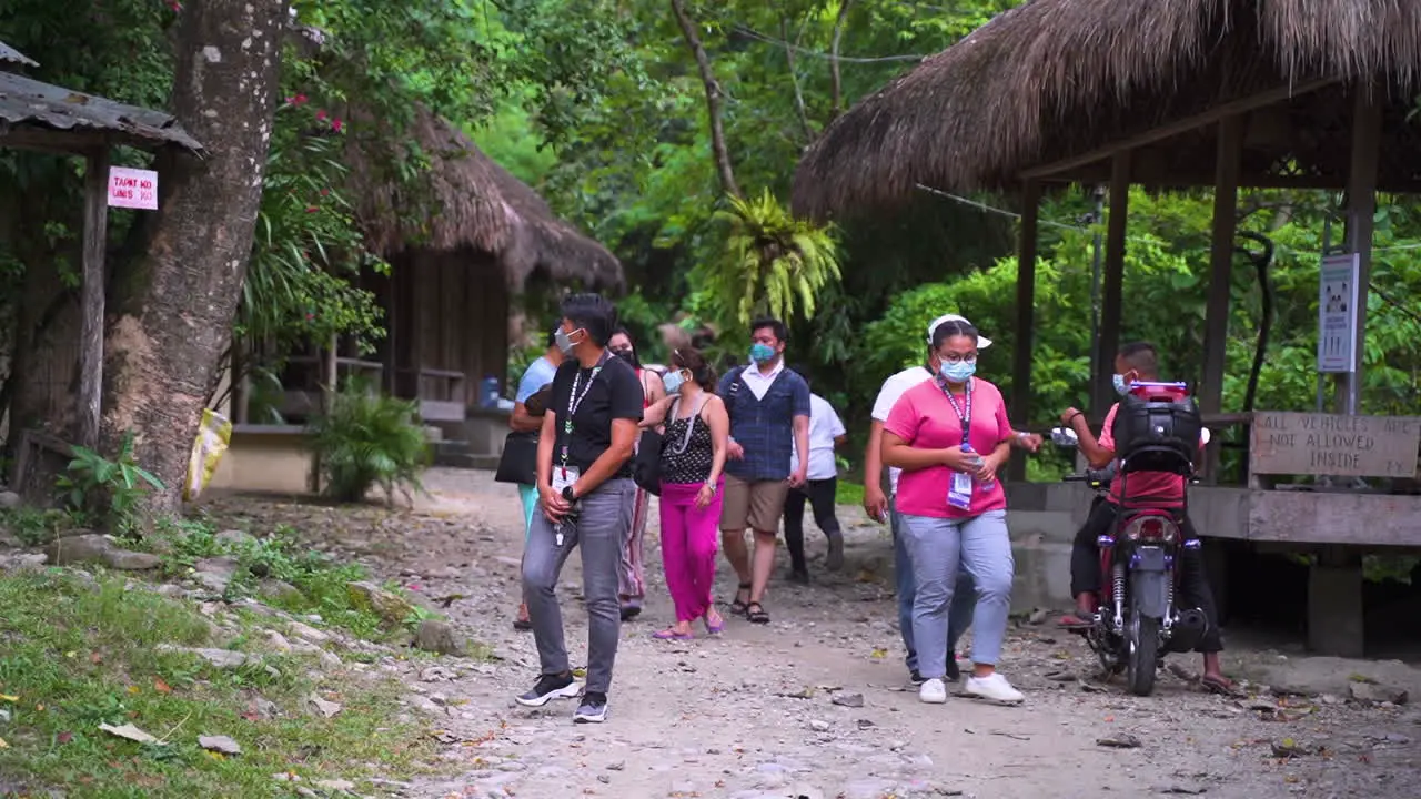 Tourists With Face Mask Walking Around In An Island With Covid 19 Pandemic