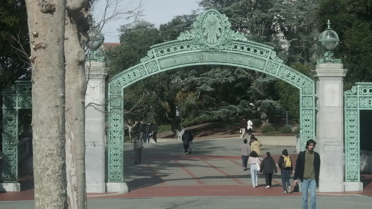 College students walking under Sather Gate at UC Berkeley