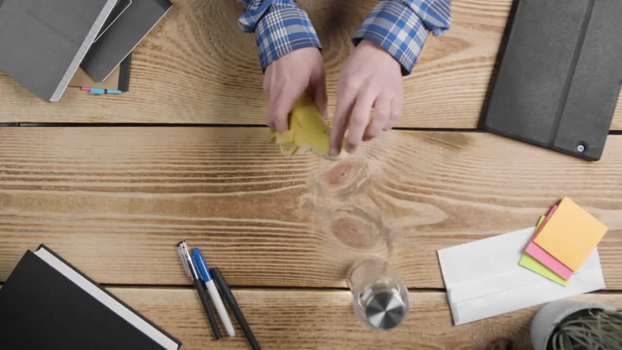 Overhead Shot of Man Eating Banana