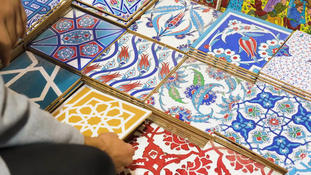 High Angle Shot of Man Browsing Tiles