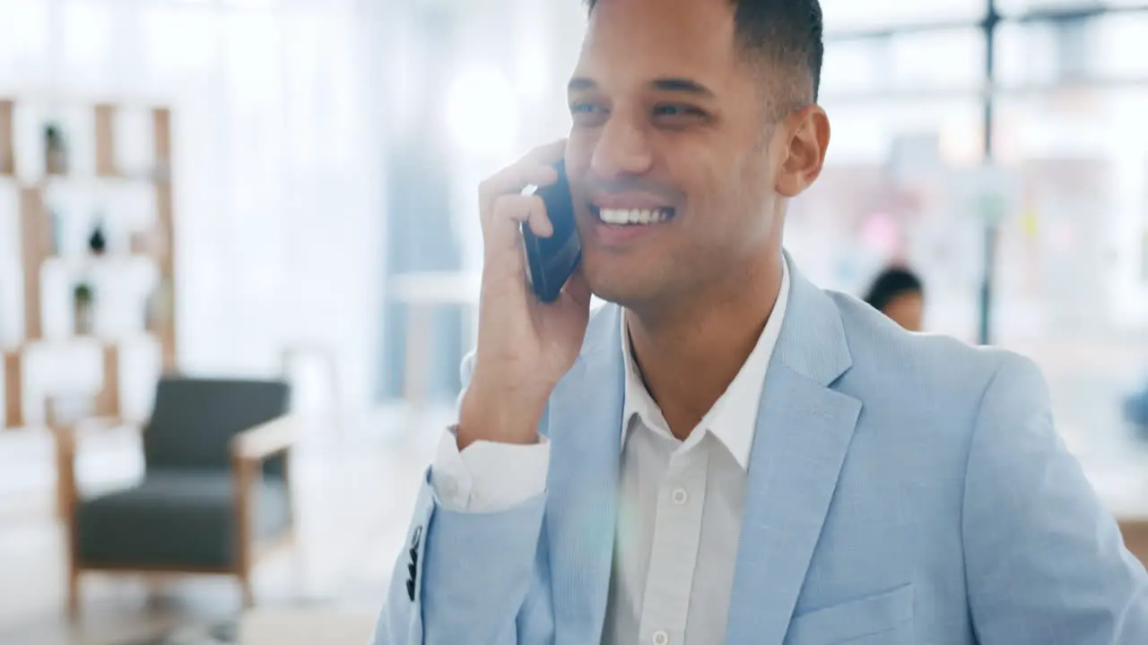 Happy businessman phone call