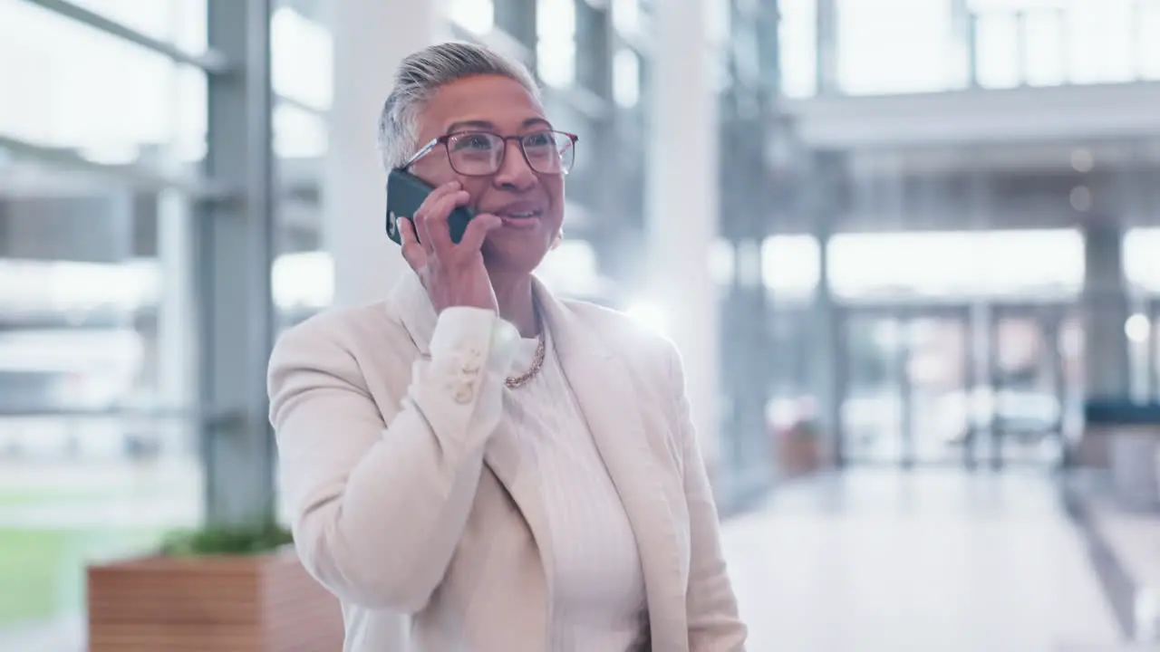 Mature business deal or happy woman on a phone